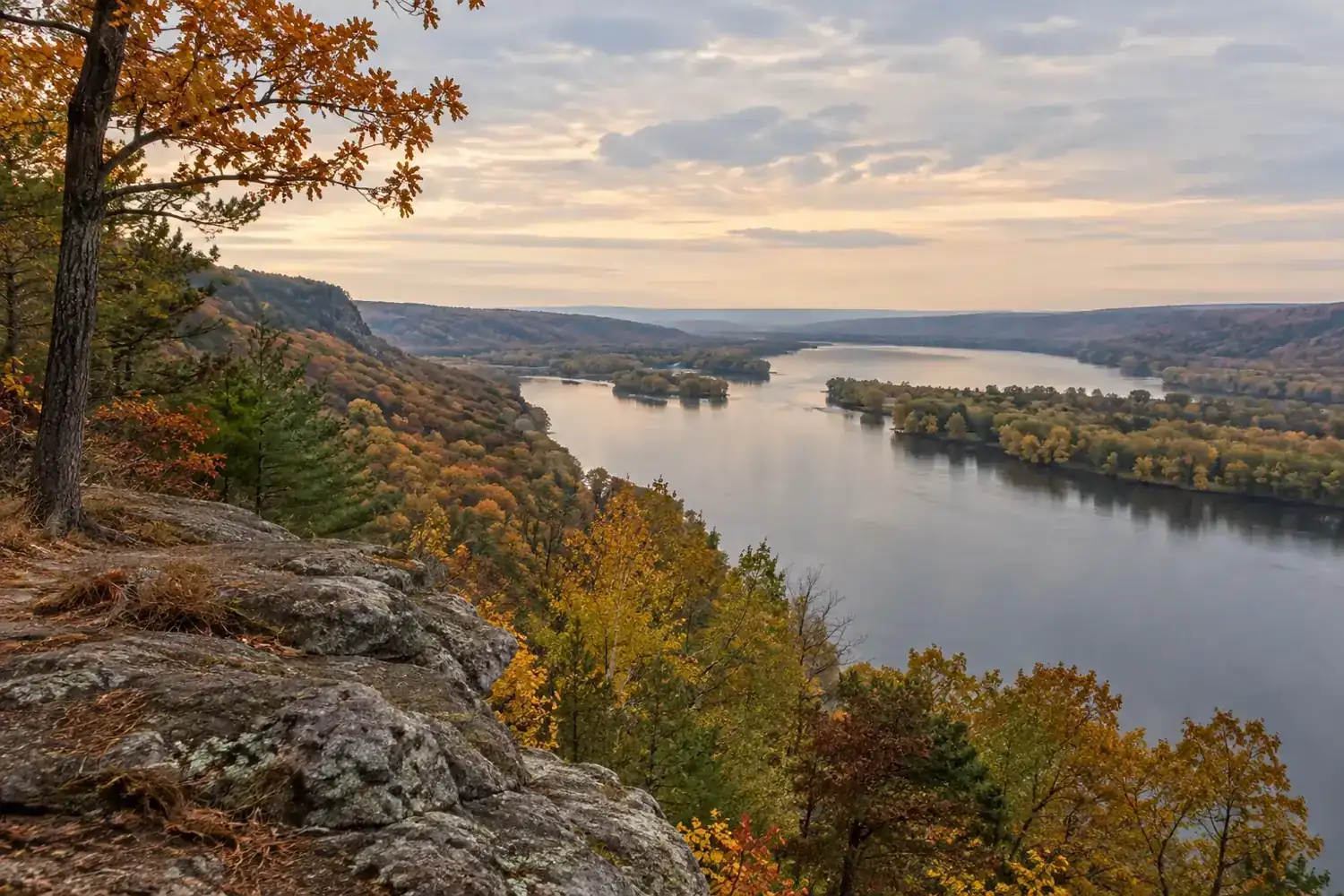 Illustrative autumn river valley with wooded bluffs and calm water